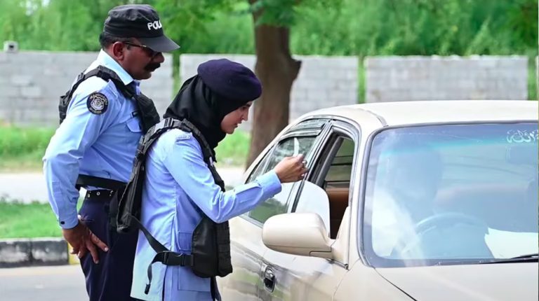 woman robbed by two fake police officials in Islamabad