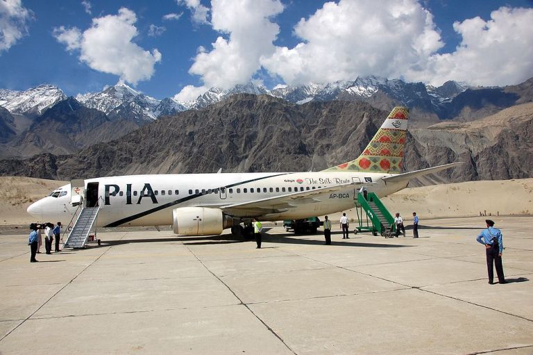 What was the record number of passengers arriving at Skardu International Airport in July?